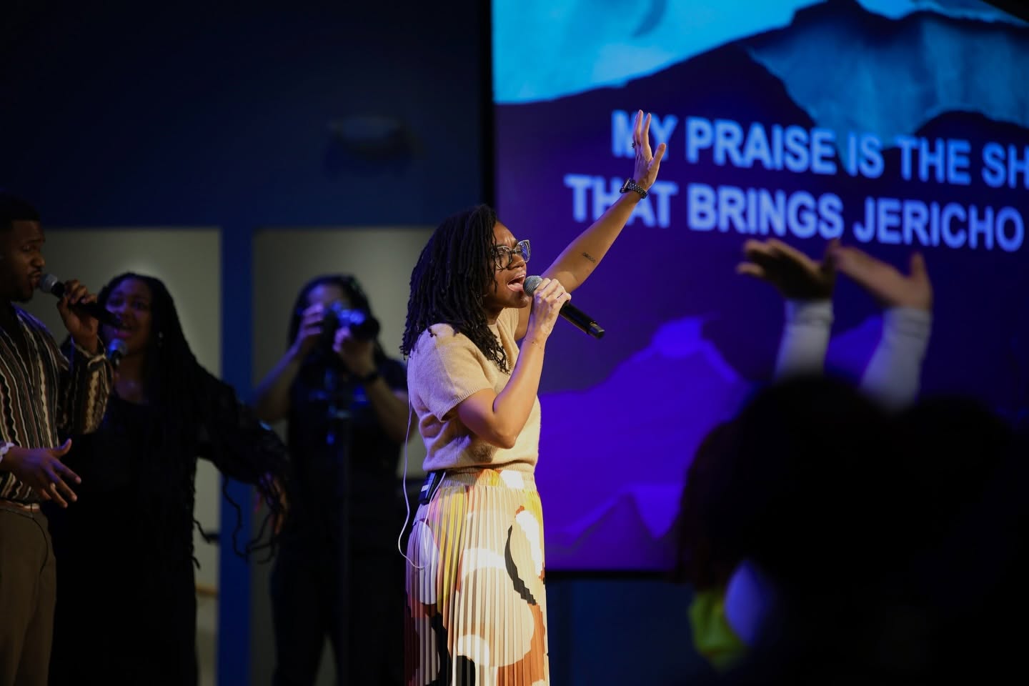 Worship leader ministering during a service